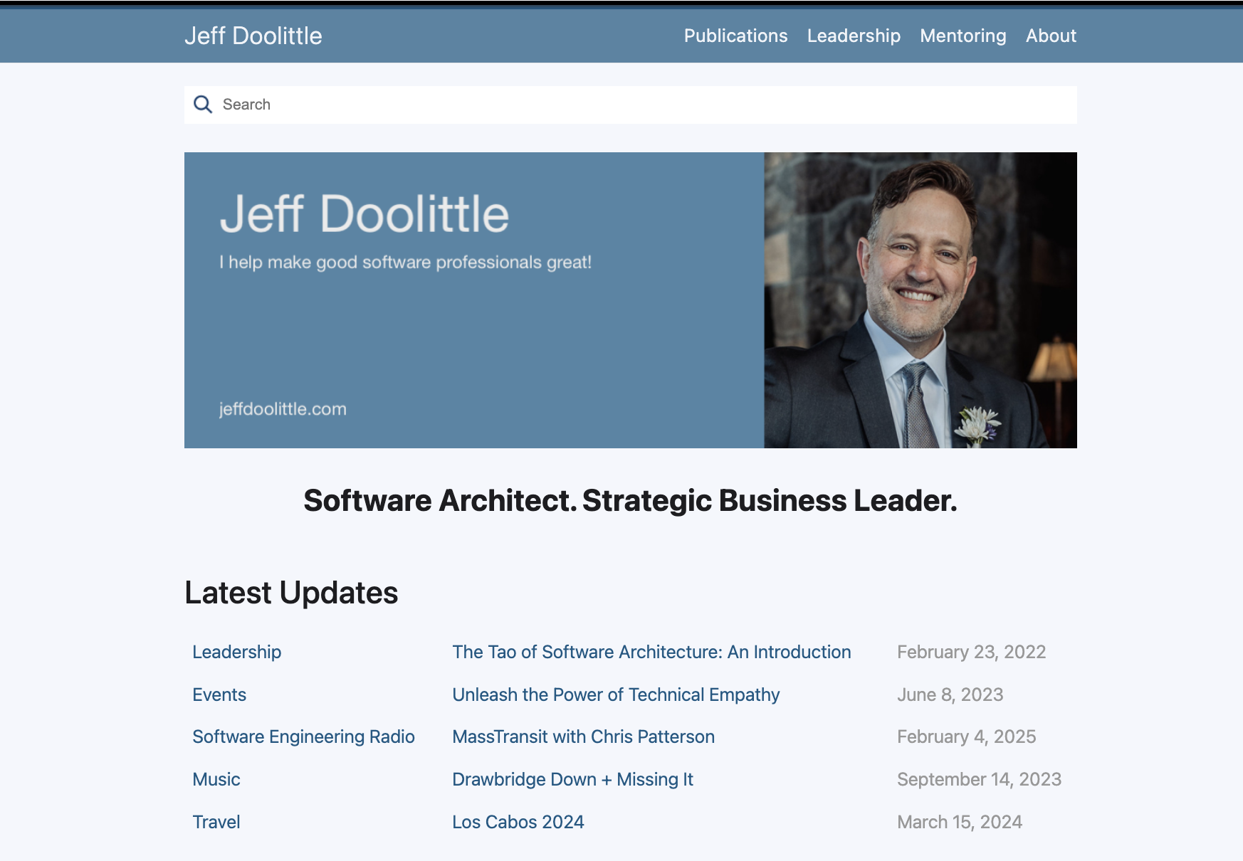 The old Jekyll homepage with the blue hero panel, portrait, top navigation, and search.